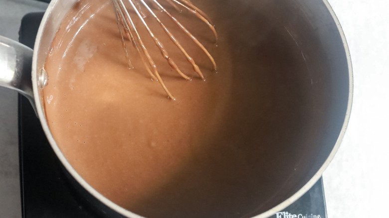 liquid chocolate mixture in a metal pot