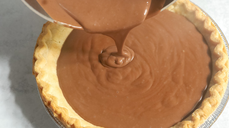 pie crust filled with chocolate pudding