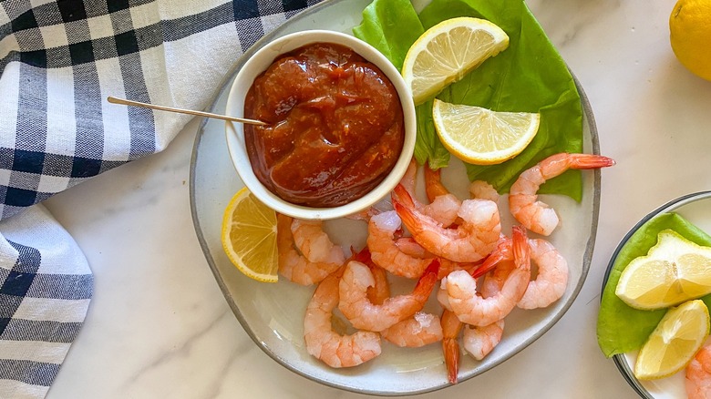 shrimp, lemon, and cocktail sauce