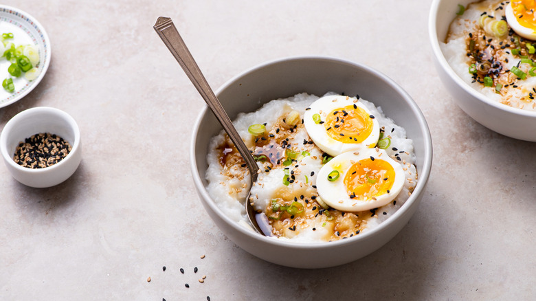 congee with egg and sesame seeds