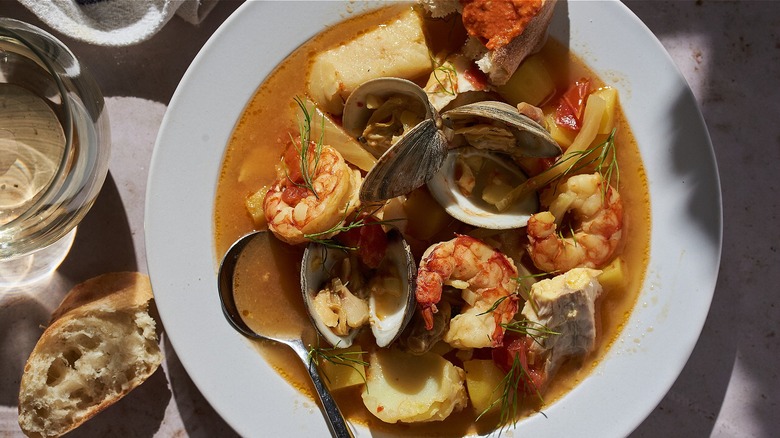 bowl of bouillabaisse with spoon