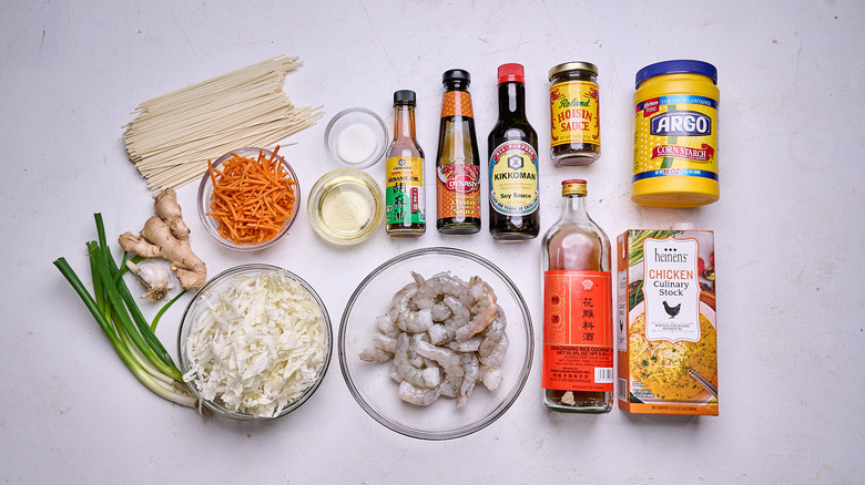 Shrimp lo mein ingredients on a table