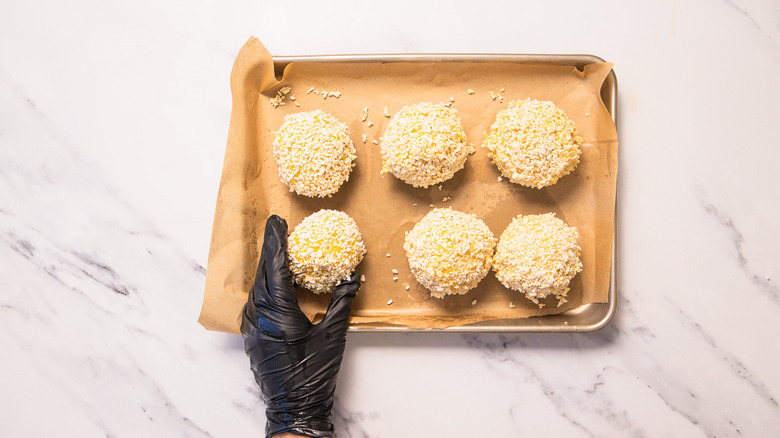 Shaped arancini on tray