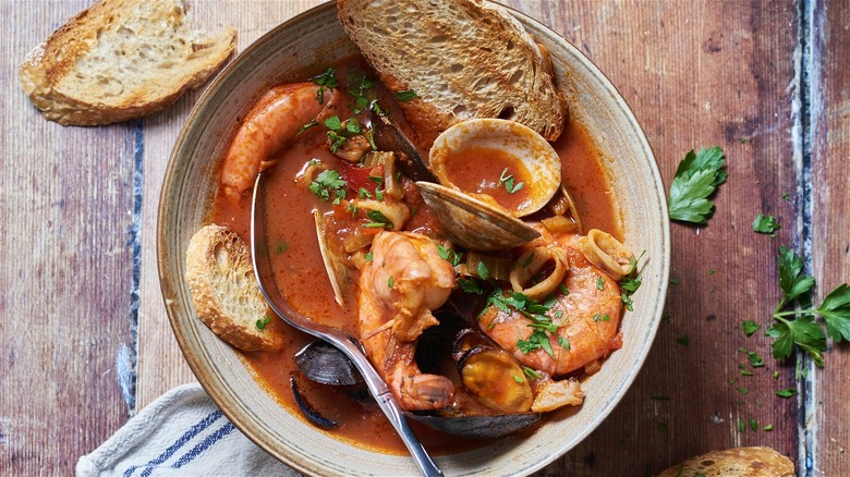 bowl of cioppino with bread