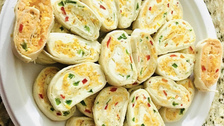 Pimento cheese pinwheel appetizers on plate