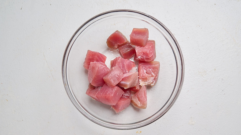 tuna chopped into cubes in a bowl