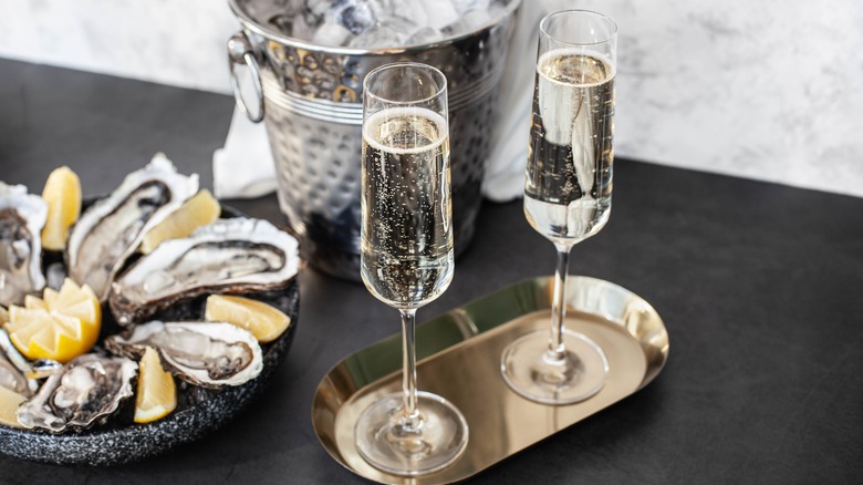 champagne flutes and oysters