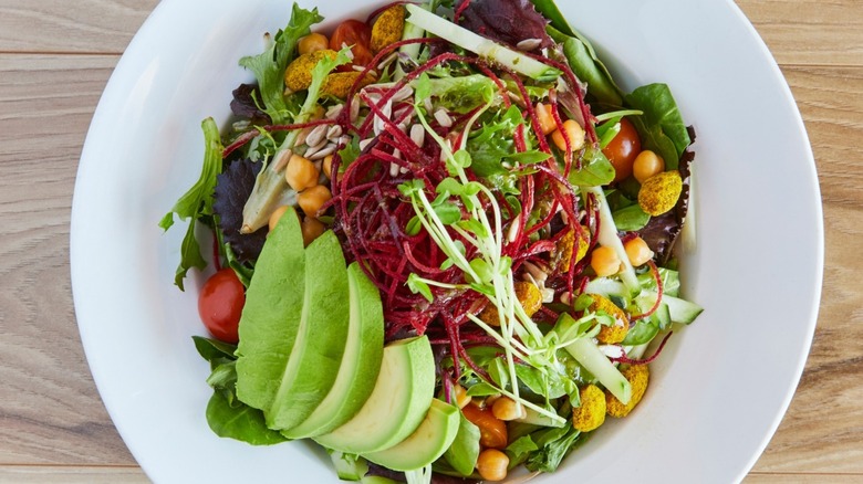 A Cobb salad with avocado and chickpeas