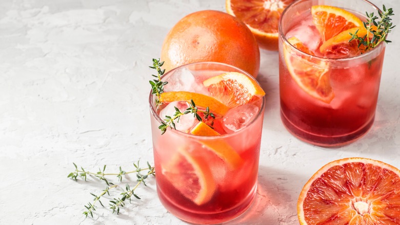 aperitif cocktails with blood orange and rosemary