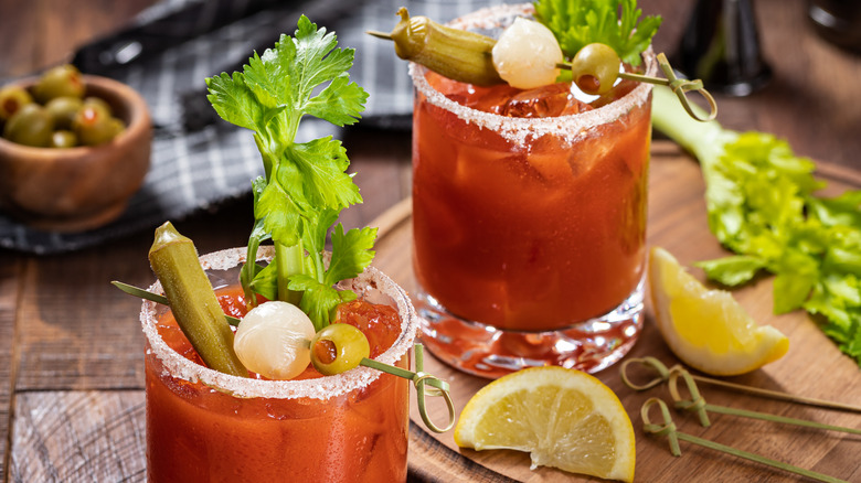 Bloody mary cocktails with garnishes