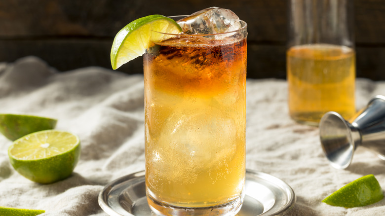 Dark and Stormy cocktail with lime
