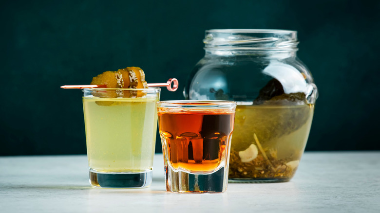 Pickle juice and whiskey pickleback shot