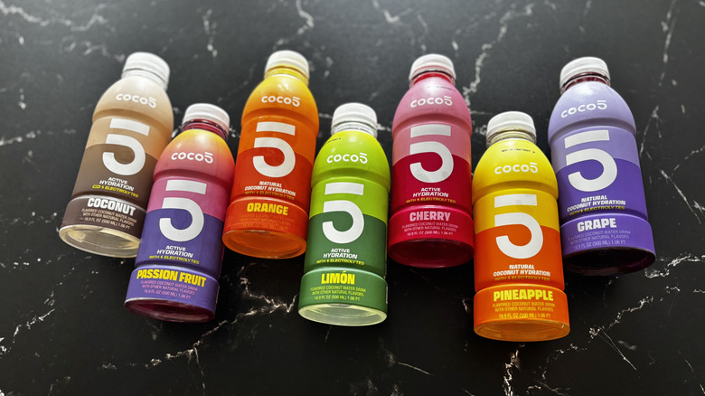 Coco5 coconut water bottles on countertop