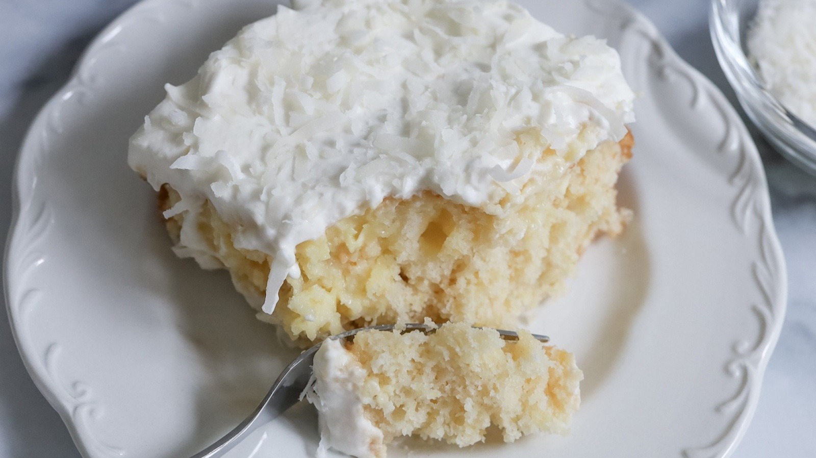 Coconut Cream Instant Pudding Is The Secret Weapon In Your Next Poke Cake