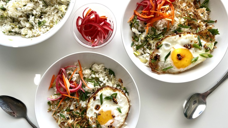 bowls with coconut rice and eggs