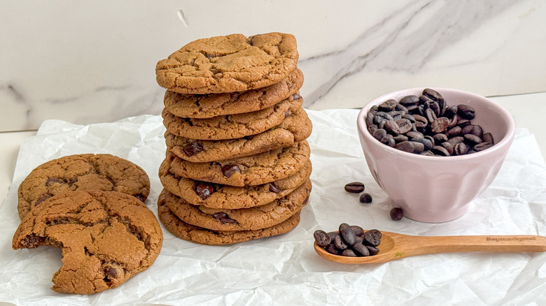 stacked coffee chocolate chip cookies with coffee beans