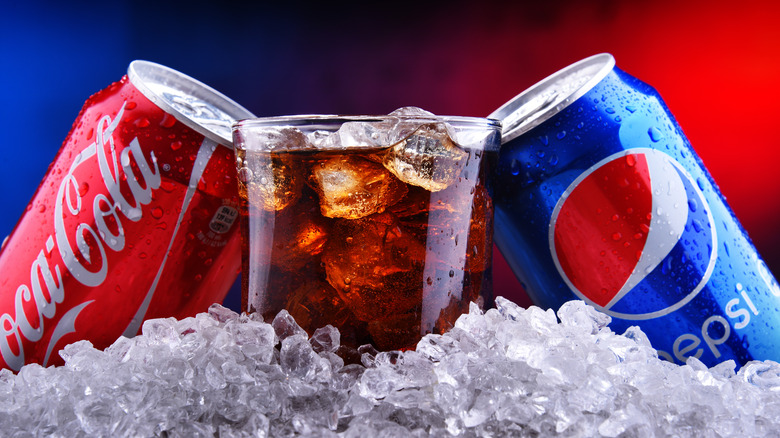 Coke and Pepsi with glass