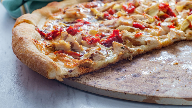 chicken pizza on pizza stone