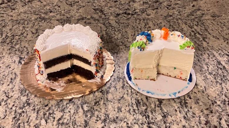 Cold Stone Creamery's Birthday cake sits next to Baskin-Robbins' Celebration Party Cake with the layers of the each cake facing forward