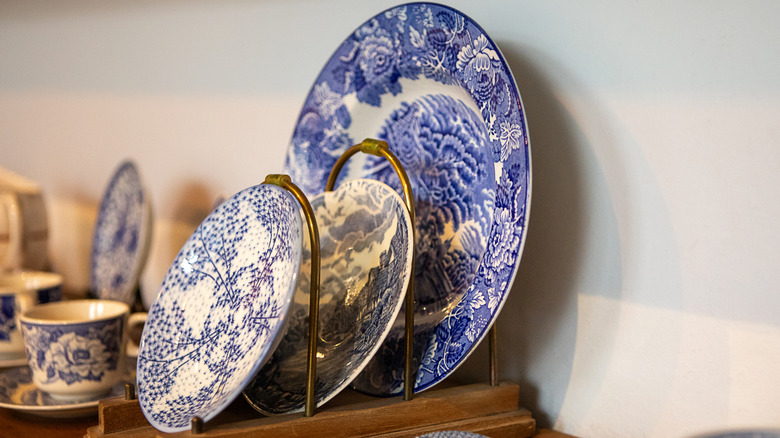 Assortment of vintage dishes displayed on counter