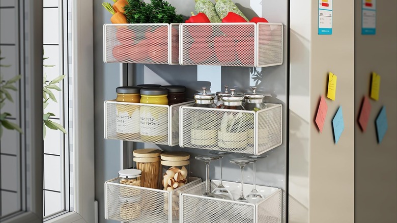 Wire shelves attached to the outside of a refrigerator