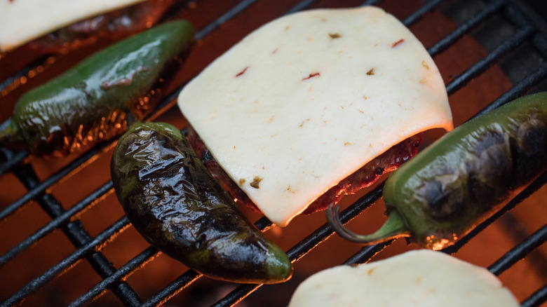 Burger with cheese and jalapeños