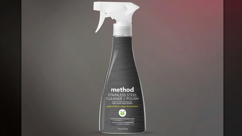 A bottle of Method stainless steel cleaner + polish with a white lid and gray bottle