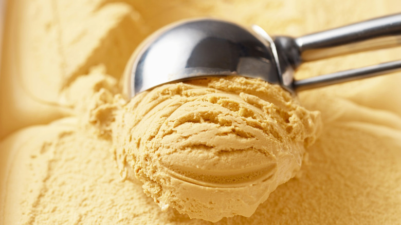 Vanilla ice cream being scooped