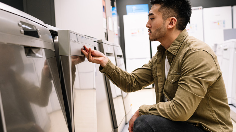 Man shopping for a dishwasher