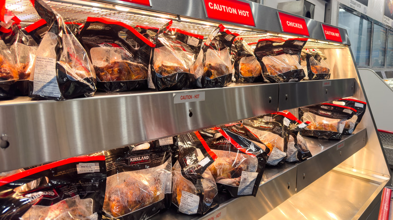 bags of rotisserie chicken for sale in Costco display