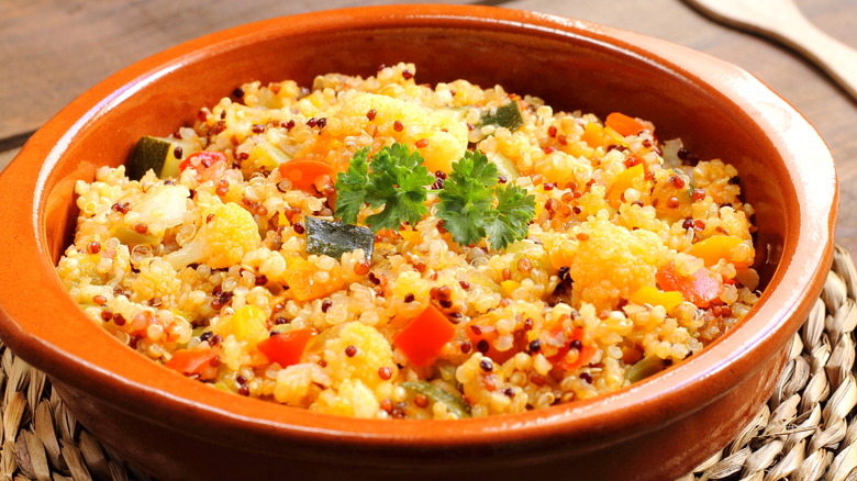 Quinoa with vegetables in bowl 