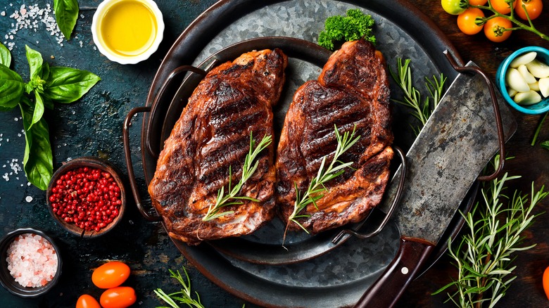 plate of cooked ribeye steaks