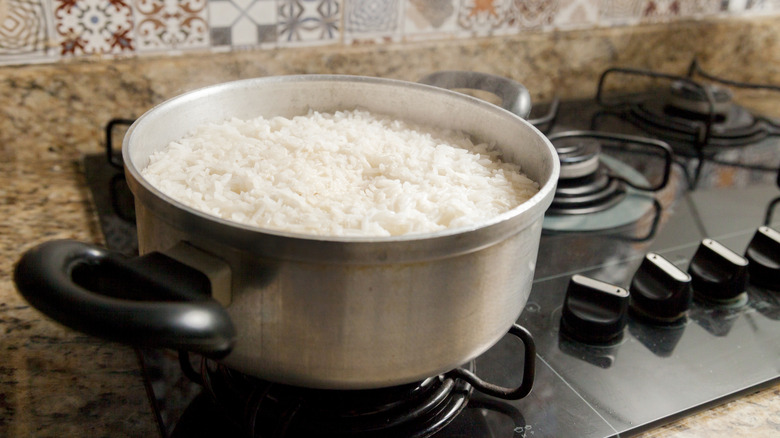 cooked rice in a pot on the stove