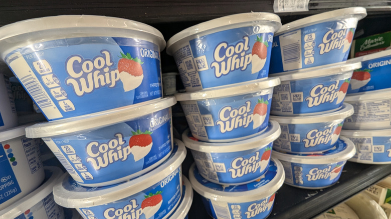 cool whip tubs on a shelf