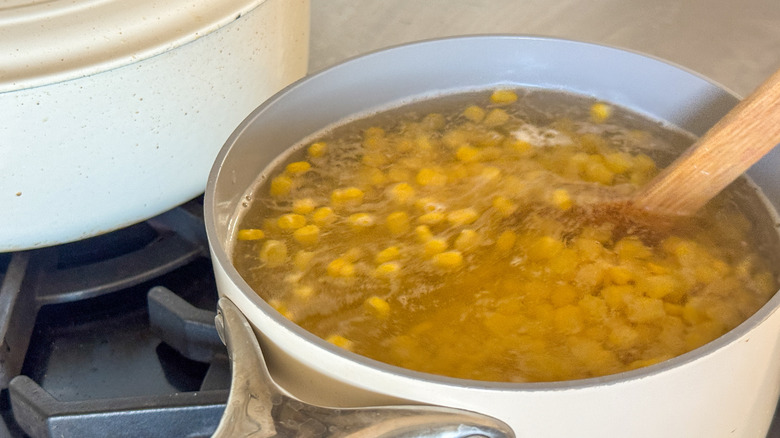 corn boiling in pot