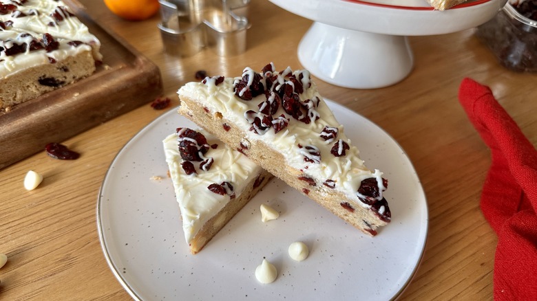 cranberry bliss bars on plate
