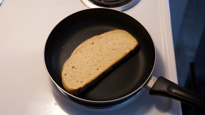 bread slice in nonstick pan