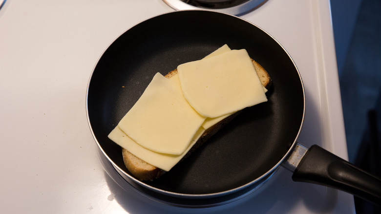 bread and cheese in skillet