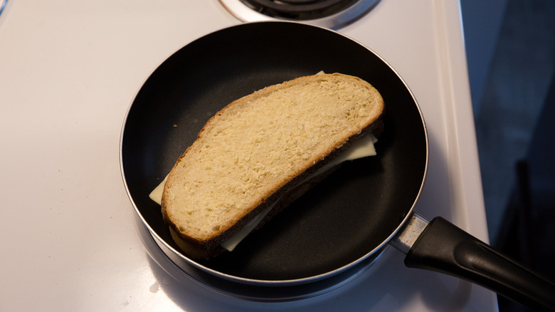 grilled cheese cooking in pan