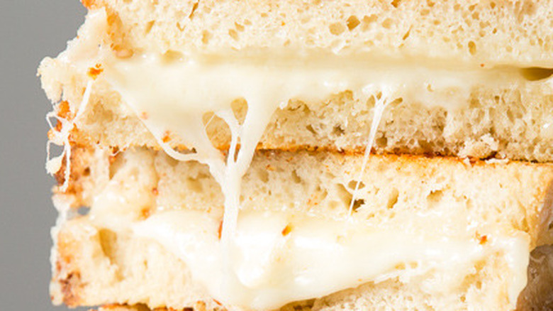grilled cheese stacked on plate