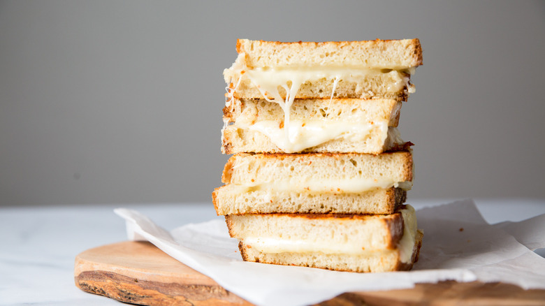 stacked grilled cheese on board