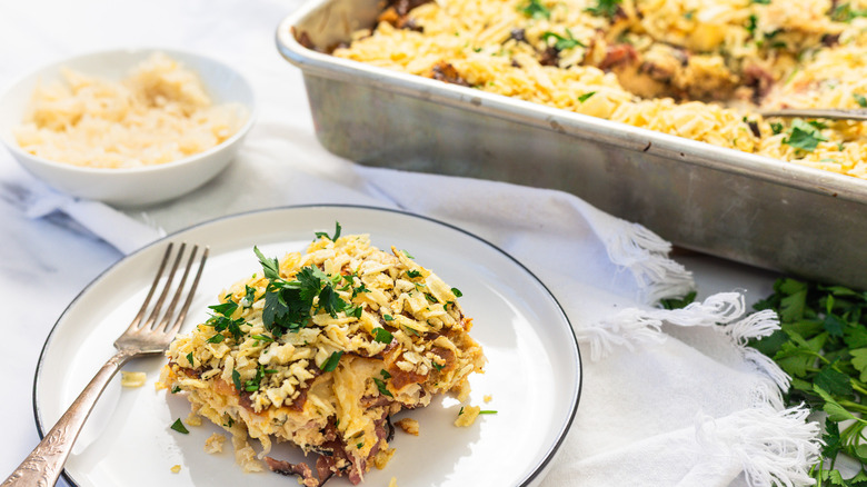 Side view of one slice of corned beef Reuben casserole.