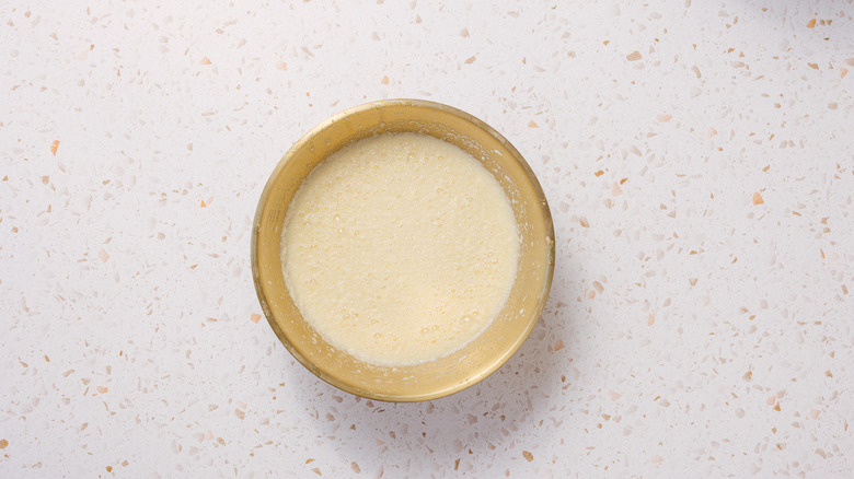 Bowl with eggs and milk mixture