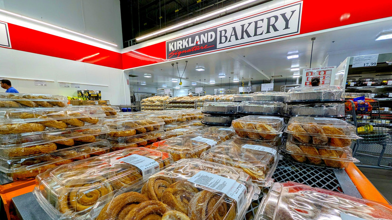 Interior of a Costco warehouse bakery section with a sign that says Kirkland Signature Bakery