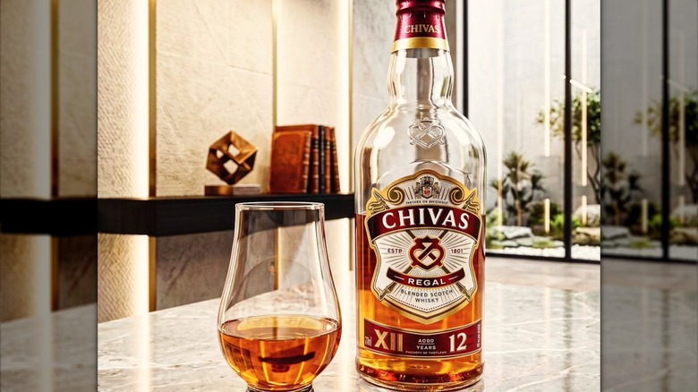 Bottle of Chivas 12 year old Blended Scotch Whiskey and Glencairn glass