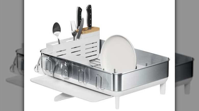 Simplehuman Steel Frame Drying Rack holding utensils and dishes
