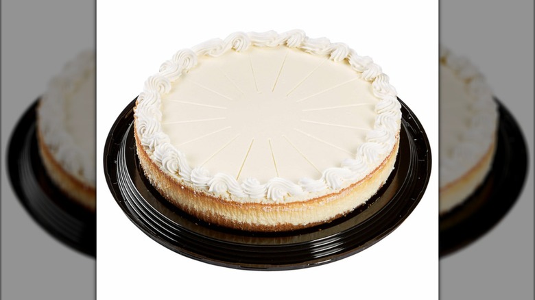 Plain cheesecake from Costco on dark plate