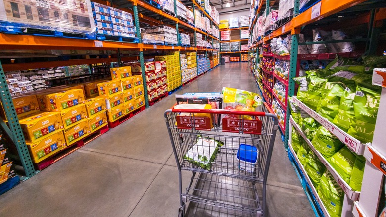 A shopping cart in the snack aisle at Costco