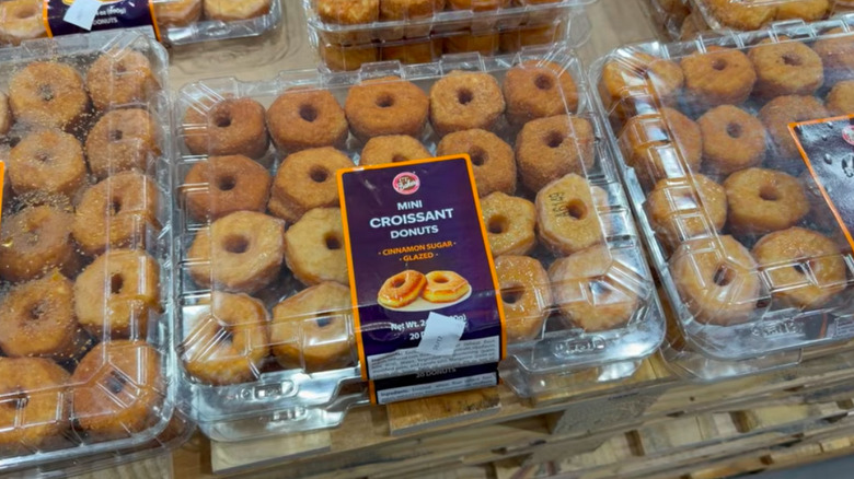 Boxes of Mini Croissant Donuts displayed at Costco.