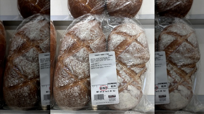 Mirrored image of a 2-pack of Kirkland's country French bread in plastic packaging
